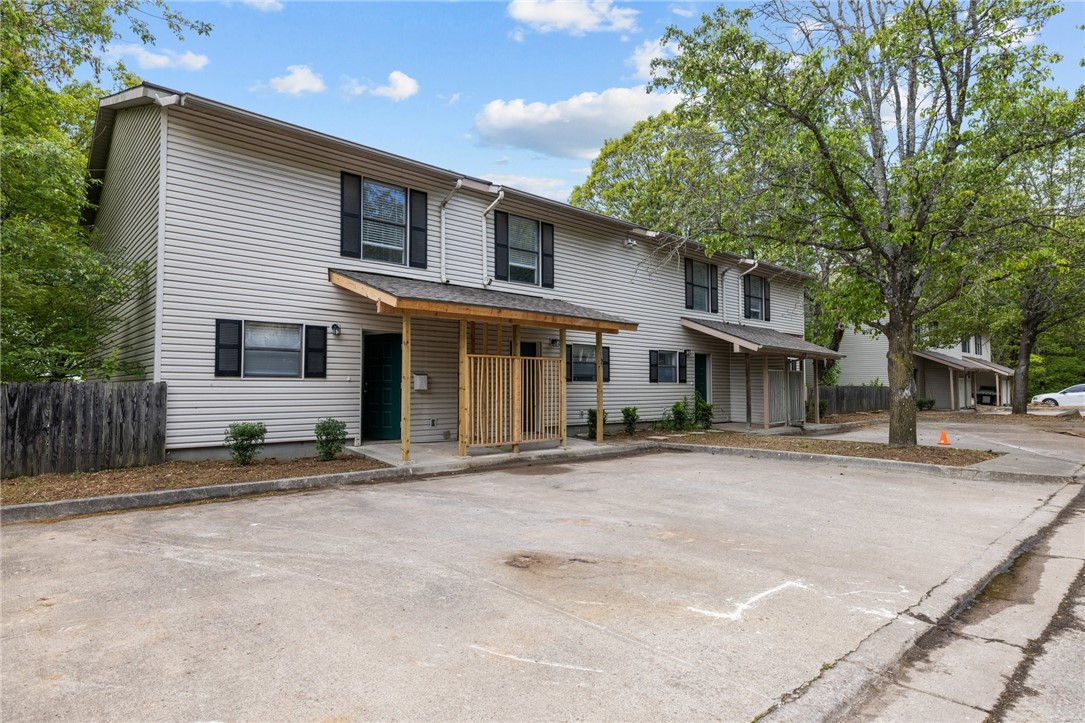 Welcome to your urban oasis right in the heart of Northwest Arkansas! Nestled within 2 miles of vibrant Downtown Fayetteville, this remodeled three story townhome offers the perfect blend of convenience and urban charm. Step inside to discover a beautifully finished basement, perfect for entertaining or creating your own private retreat. The spacious bedrooms provide ample space for relaxation and rejuvenation. Situated in a quiet community, enjoy peaceful evenings and take leisurely strolls through the neighborhood. With its prime location just south of Mount Sequoyah, this townhome is the epitome of Fayetteville living at its finest. Don't miss out on the opportunity to make this your new home sweet home! No SPD will be provided. Photos are a representation of the layout, condition of the unit is not remodeled and has older features. Schedule your showing to see today!