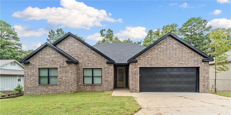 Gorgeous all brick, new construction with one year builder's warranty. There are so many bonuses with this property - this home is a 3 bedroom home on sewer, not septic! No carpet! - all beautiful LVP throughout. Great floor plan with an open kitchen to the living area, with natural warm toned cabinets and brushed gold pulls. Large pantry and laundry room with mud room for ultimate organization. Large master bedroom and bathroom with double vanity, soaking tub and large closet. Plenty of storage space and abundant charm and a private, tree laden vista in the back yard. Enjoy Bella Vista's vast amenities like tennis, clubhouses, golf, trails, lakes and biking!