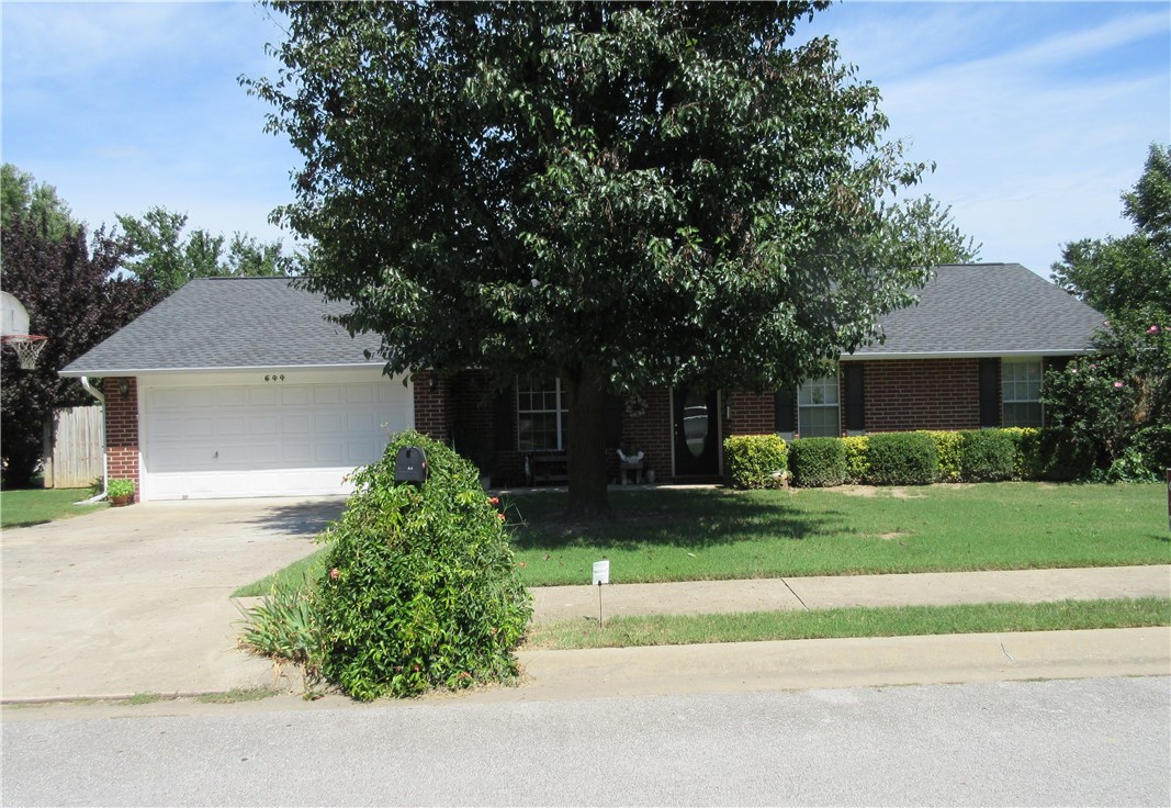 644 West Oaklawn Drive, Springdale, 3BR,2Bath, Brick w/2 Car Garage on corner lot with privacy fence, wood burning fireplace w/insert. Aqua thermal heating unit, 75 gal. water heater (2009), architectural shingles (2010), Maytag dishwasher (2017), blinds, French doors to back patio. SELLER WILL GIVE CARPET & PAD ALLOWANCE. BACK ON MARKET.