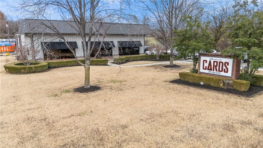 Office/Warehouse just off Don Tyson Parkway!  Great location, halfway between Johnson Mill Blvd and Don Tyson Parkway.  Quick access to 71B and I49 and just blocks from Tyson Headquarters.  Additional 2500 +/- sqft of office space added upstairs.  5 acre lot creates extra yard space with gated access.  Two 16’ overhead doors

Three parcels 815-29552-000, 815-29554-001, 815-29554-000