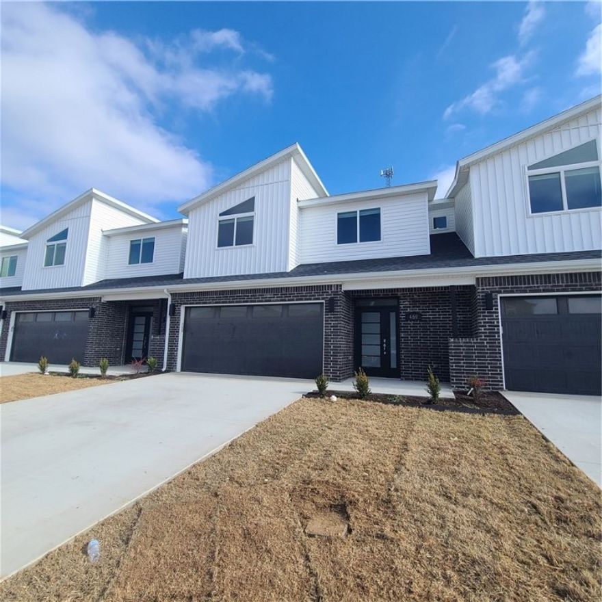 New modern design duplex! Also included brand new side by side stainless refrigerator, washer, and dryer. This 3 bed 2 1/2 bath plan has an open living concept with tall ceilings and tons of natural light. Kitchen has granite countertops, stainless appliances, a large pantry, and a gas range. Primary suite is on the main floor and has a beautiful walk-in shower and a large walk-in closet. Two bedrooms upstairs with a full bath and landing area. Wood look tile in the main living areas, 2" faux wood blinds, extra storage in the upstairs attic. Property has a private back patio and wood privacy fence. Owner must approve pets and no smoking.