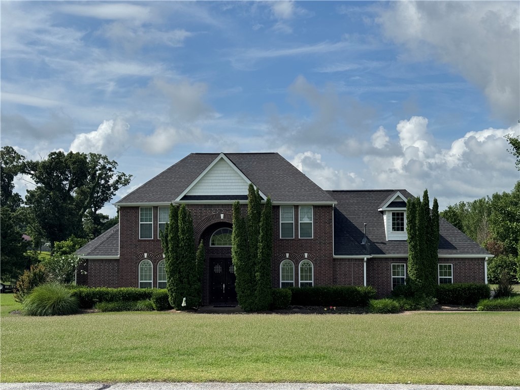 Tucked away on nearly 2 acres in one of the area’s most private and sought-after neighborhoods, this home delivers space, comfort, and a setting that’s hard to match. Inside, you'll find 4 bedrooms, two living areas, a dedicated office, and a bonus room, plus a two-story foyer and a kitchen built for both everyday use and entertaining. Hardwood floors, granite counters, walk-in closets, and a smart layout make the home as functional as it is inviting. And out back? A low-maintenance in-ground saltwater pool with an in-floor cleaning system—ready for summer.