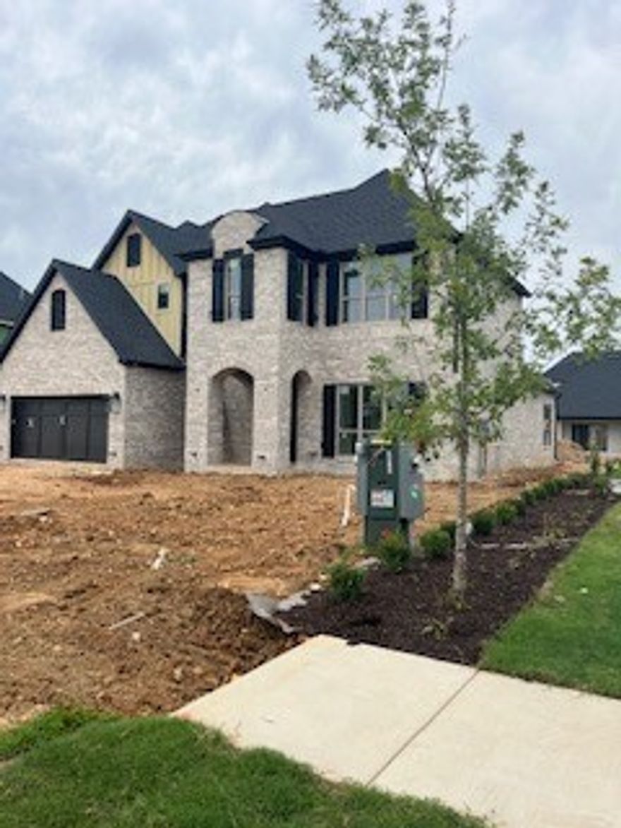 Great Open Floor plan, spacious layout, with premium features including  quartz countertops, hardwood floors, free standing soaker tub in the primary bath, also a Fridge and washier and dryer are included. The main floor includes 2 bedrooms & 2 full baths one being he primary suit which offers a larger shower, soaker tub and separate vanities. The upstairs game room and 3 bedrooms and 2 additional baths make this home perfect for entertaining family and friends. Plus the extended covered patio and 3 car garage adds even more appeal. Don't miss outon this fantastic home.