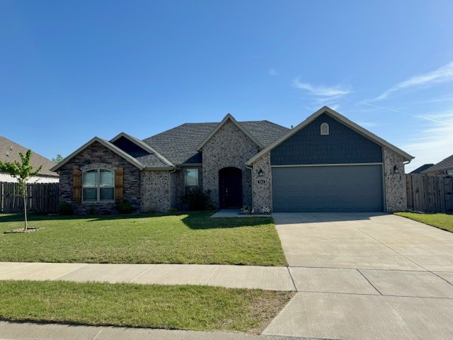 Built in 2021 this 3 bed 2 bath home is just minutes from Downtown Bentonville and the Walmart Home Office. This property includes a privacy fenced yard, luxury vinyl plank flooring, granite counter tops, 2" faux wood blinds, custom tile shower in master and much more!