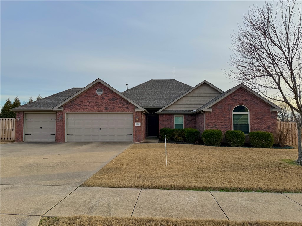 Nestled on a flat corner lot in a prime Bentonville location, this spacious 4-bedroom, 2-bathroom home offers 2,104 square feet of comfortable living space. The open-concept layout features a well-appointed kitchen with granite countertops, ample cabinet storage, and plenty of counter space for meal preparation. The homeās three-car garage provides generous parking and storage options. Conveniently located with easy access to I-49, the new Walmart Campus, Downtown Bentonville, biking trails, and the David Glass Technology Center, this property combines comfort and convenience in one desirable package. Faces North. Fridge provided by owner.