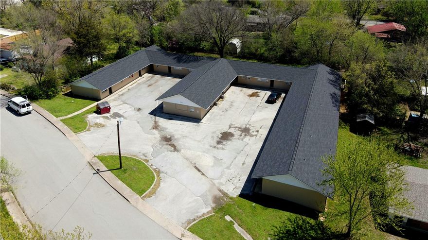 Are you looking for a place to put your money to work? This apartment building is a fantastic way to get predictable income and appreciation in a fantastic location in bustling Fayetteville, AR. Just a short walk to the U of A or shopping and dining, this location keeps the units occupied. Boasting a full renovation of each unit in the last 3 years, this solid building is ready to keep making money for years to come!  In 2021 the building got a new roof, new steel doors and each unit has been renovated with new flooring/paint/fixtures and most of the units have new cabinets and appliances as well! Newly surfaced parking lot in 2024 adds to the value and fantastic low maintenance structure, making this a wonderful investment.  Whether you are looking for a 1031 exchange purchase or just a way to diversify your investments you can't go wrong with such a great apartment building in Fayetteville AR. Agent Owned