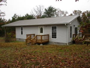 Private with room to roam. 9+/- acres full of possibilities. Seclusion, small farm, recreation, future home sites, family areas, the choices are endless. The woodwork and amenities of the home are something you will fall in love with!