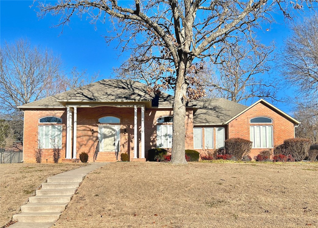 Stately brick home in established, quiet neighborhood with gently rolling hills and mature trees. This home has some wonderful upgrades and features: 12' ceilings, custom cabinetry, crown moulding, plantation shutters, extra storage, and multiple extra living spaces including a sunroom overlooking the private backyard, a family room, and a bonus room above the garage that provides an additional 157 sf of living space. Master suite boasts vaulted ceilings, generous walk-in closet, double sinks and jacuzzi tub. This well cared-for home has had only one owner. New roof in 2021. This special property is in a coveted neighborhood and won't last long. Come tour today!