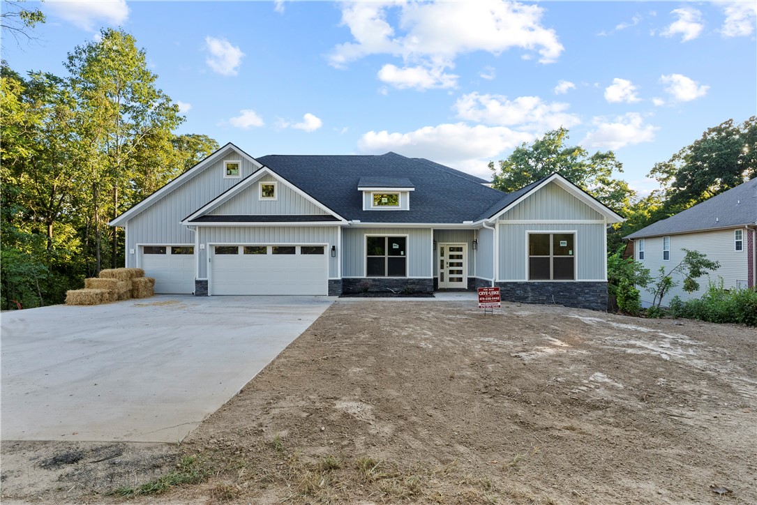 New construction home with easy access to Hwy 71B/I-49! Bentonville School District! Hop on trails quickly and easily. Take a look TODAY at this beautiful 4 Bedroom, 3.5 Bath with 3 Car Garage home. This home has over 3500 Sqft and features an Open Concept Living with split floor plan! Spacious kitchen features a large island, pot filler, plenty of cabinets for storage and a large panty as well. Perfect kitchen for cooking big meals to entertain. Eat-in Dining area overlooks the backyard. Eat your meals and enjoy the view of nature outdoors. Owner Suite has double vanities, soaking tub and a large walk-in closet which opens to the laundry room for added convenience. There is a Jack-n-Jill bathroom between 2nd & 3rd bedrooms downstairs. Upstairs features a second living area/bonus area with 2nd story balcony, Study/Office area and 4th Bedroom & bath. Cox internet available! There is so much this home has to offer. Don't delay, schedule your appointment today!