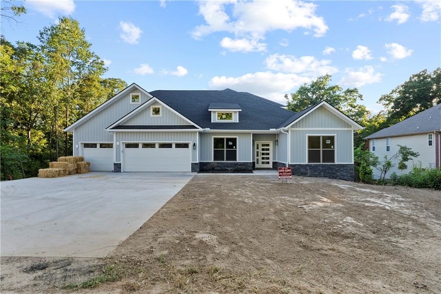 New construction home with easy access to Hwy 71B/I-49! Bentonville School District! Hop on trails quickly and easily. Take a look TODAY at this beautiful 4 Bedroom, 3.5 Bath with 3 Car Garage home. This home has over 3500 Sqft and features an Open Concept Living with split floor plan! Spacious kitchen features a large island, pot filler, plenty of cabinets for storage and a large panty as well. Perfect kitchen for cooking big meals to entertain. Eat-in Dining area overlooks the backyard. Eat your meals and enjoy the view of nature outdoors. Owner Suite has double vanities, soaking tub and a large walk-in closet which opens to the laundry room for added convenience. There is a Jack-n-Jill bathroom between 2nd & 3rd bedrooms downstairs. Upstairs features a second living area/bonus area with 2nd story balcony, Study/Office area and 4th Bedroom & bath. Cox internet available! There is so much this home has to offer. Don't delay, schedule your appointment today!