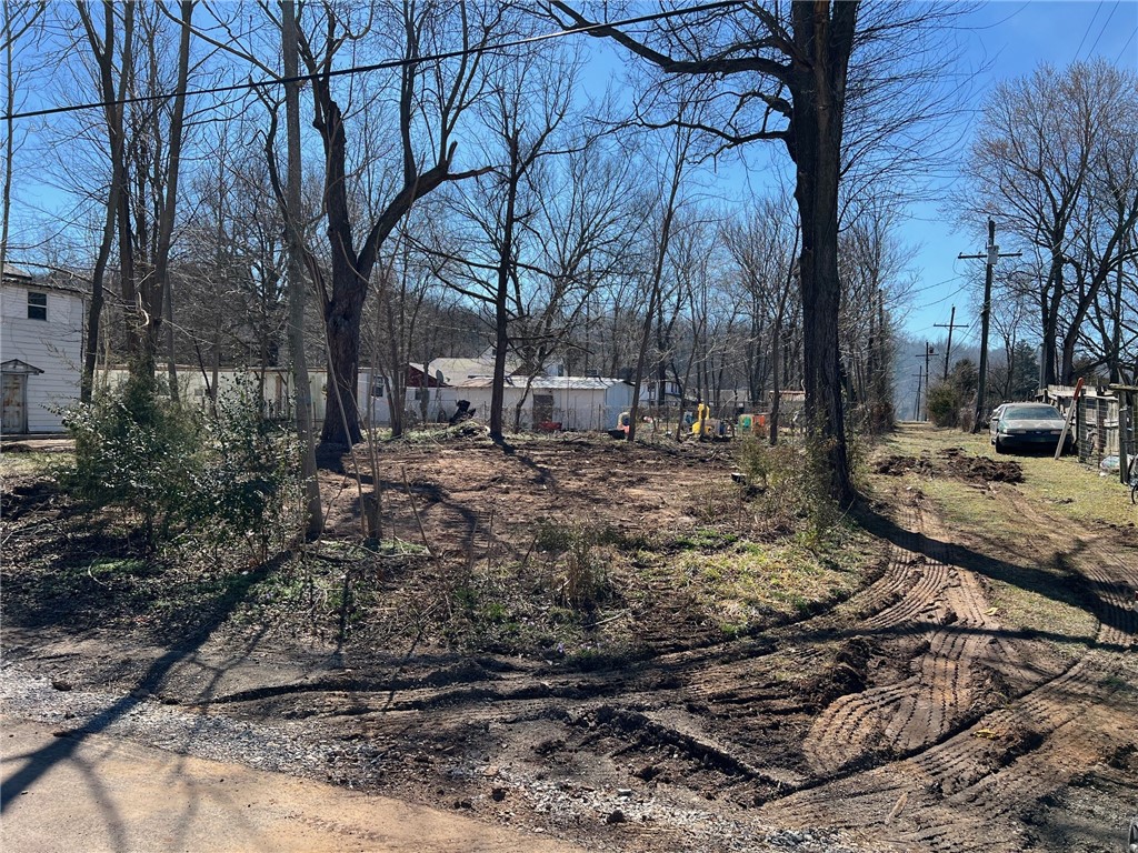 Nice buildable lot available in Sulphur Springs, AR, within the Gravette School District. This in-town property offers a great opportunity to design and build the home you’ve been wanting. Enjoy the peaceful setting of a small community while still having access to nearby conveniences and an easy drive to surrounding areas. A solid option for anyone looking to build or invest in a growing part of Northwest Arkansas. Agent owned.