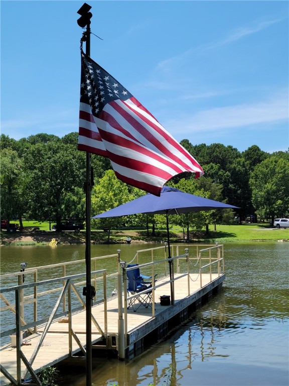 Charming Lakefront Home with Boat Dock & Stunning Sunsets
Discover the perfect blend of character and comfort in this inviting home on beautiful Lake Dardanelle. Enjoy breathtaking sunsets, exceptional views, and a private boat dock just steps from your door. Many plantings throughout the property offer seasonal surprises and delights. This 3-bedroom, 2-bath residence is located right across the street from John Dalyās 18-hole golf course, making it a dream for lake and golf enthusiasts alike. A separate 1-bedroom, 1-bath suite off the 2-car garage provides an ideal space for guests, extended family, or a private office. Features include two new HVAC units, Marathon hot water heaters, a security system, two walk-in closets in the primary suite, and oversized closets in the additional bedrooms. Spend mornings by the water, afternoons on the course, and evenings watching the sun set over the sparkling shorelineāthis is lake living at its finest.