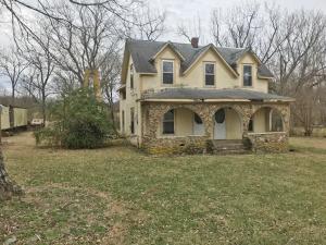 Older 4 bedroom 1 bath home in downtown Western Grove. Seller believes home was built around the turn of the century. Has been insulated and sheet rocked, updated wiring, concrete septic, plumbing. Needs roof, propane tank leased. Single pane windows w/storms. Carpet is good. Interior looks good.