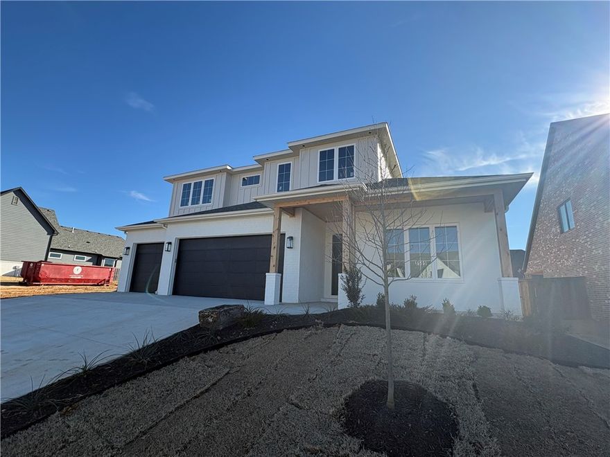 Welcome to the highly sought-after Aurora Subdivision, perfectly situated just minutes from the best of Rogers and Bentonville! Experience refined living in this beautifully designed David Harris home, offering 4 bedrooms with both the primary and guest suites conveniently located on the main level, plus 4 baths. Designed for both comfort and style, this home boasts an open layout with a chef’s kitchen, inviting living room with fireplace, and dining area. The second level offers a versatile bonus/5th bedroom, two additional bedrooms, a Jack-and-Jill bath, and a full bath. A generous covered patio extends your living space outdoors, opening to a beautifully level backyard. Amenities abound in this incredible community, including an adult pool, family pool, bike repair station, dog park, elevated fitness course, sports court, open-air clubhouse, and playground. Internet is included in the POA! Seize the opportunity to own a meticulously built David Harris home, perfectly placed in a prime location!