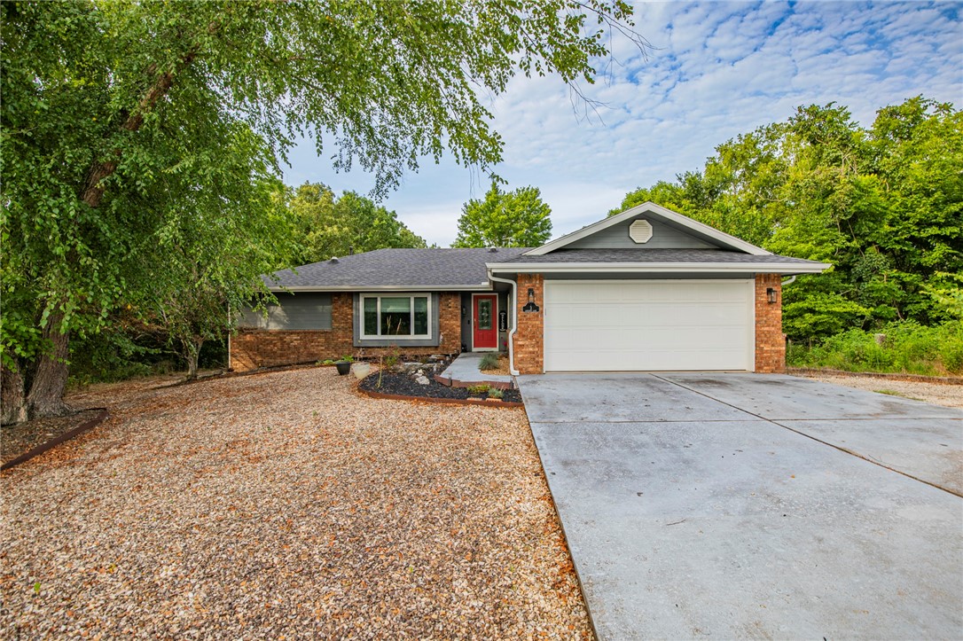Beautifully updated and well maintained 3-bedroom, 2-bath home just across the street from Scotsdale Golf Course. The home has engineered hardwood flooring, granite counter tops, new Royal windows in the sunroom, new gutters, and a new roof in 2016. Low maintenance yard with decorative gravel, and Trex planks on the deck. Located in the Highlands, it's only 2 miles to the Loch Lomond Marina, less than 3 miles to the Walmart Supercenter in Jane, and it's near the Tunnel Vision Mountain Biking Trail.