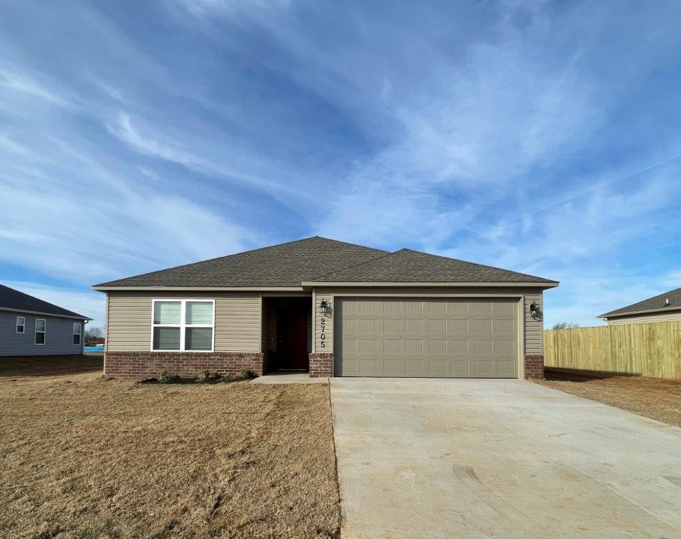 One level 3 Bedroom, 2 bath home with a 2-car garage. Open living room, kitchen, and eat in kitchen space, fridge provided. Spacious walk out partially covered patio space. Quick access to I49, shopping, dining, & entertainment.