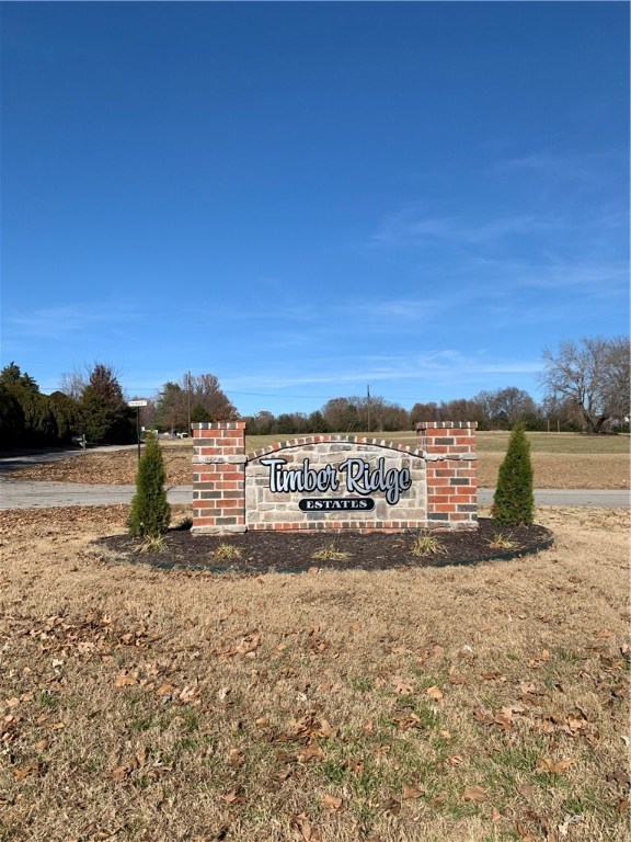 Lot priced less than developers lots. Beautiful 1-acre lot in North Rogers subdivision. Minutes from town but still secluded in wooded subdivision that is ready to build on. This subdivision has paved road, public water, gas and protective covenants. 2500 minimal square footage. Great for custom or speculative homes in Rogers School district. This subdivision has designated lot for common area. Fiber High Speed internet. Close to Big Sugar Goff Club (members & public). Close to Sam's Club and other downtown business and amenities. Don't miss out.