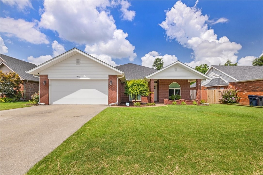 Welcome to this beautifully renovated 4-bedroom, 3-bath home with two primary ensuite bathrooms. Just minutes from shopping, dining, and only a few miles from the Walmart Home Office Campus, this home offers both convenience and comfort. Inside, you'll find a modern layout with new luxury vinyl plank and tile flooring, fresh interior paint, custom window treatments, and updated lighting throughout. The kitchen has been opened up and completely remodeled with quartz countertops, new cabinetry and island, sleek appliances, and an openness that enhances the flow of the living space. Additional highlights include a resurfaced fireplace, new windows throughout, front and back doors, insulated garage door and system (2024), and new exterior siding. Outdoor living shines with a new composite deck, pergola with solar shades, and a dedicated grill pad. This home has many more upgrades to see, and with a newer roof (2020) and an optional furniture package available, this home is truly move in ready!