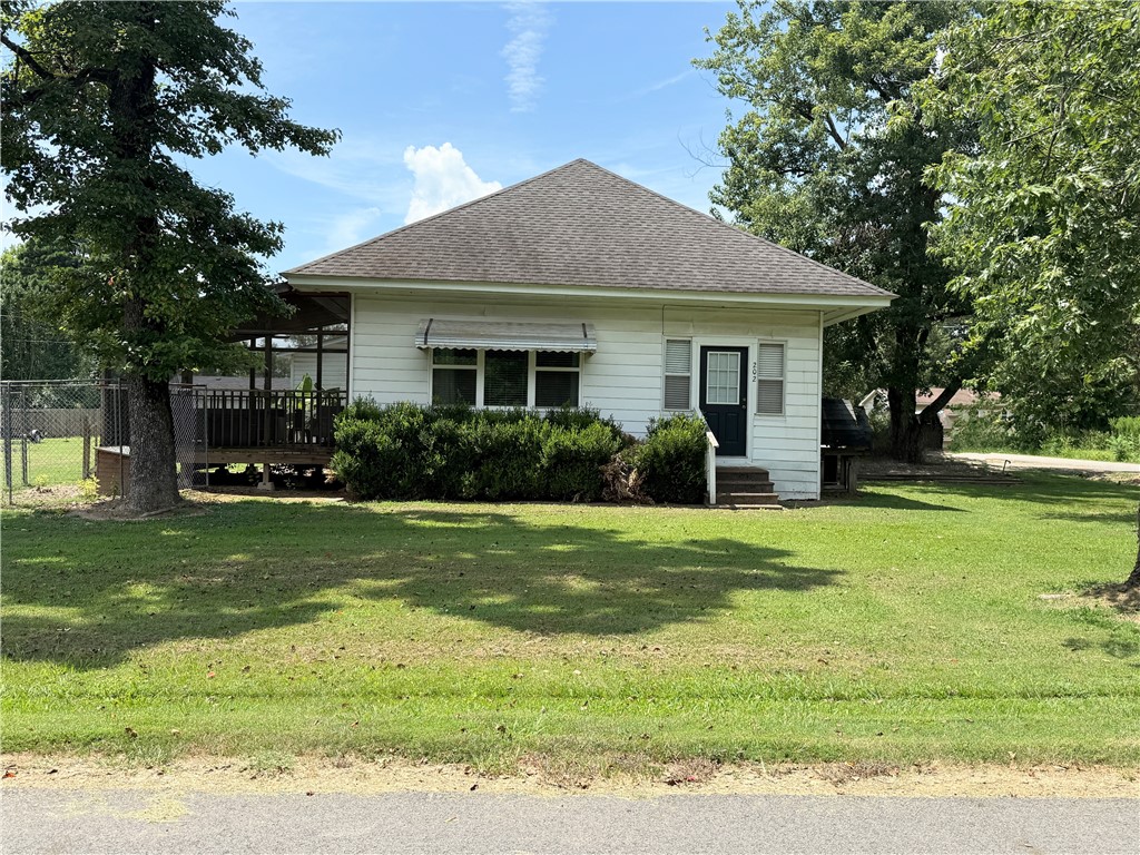 Cute, cozy, and packed with extras! This adorable 2-bedroom, 2 bath home sits on a corner lot and offers a warm, welcoming feel from the moment you pull up. Inside, you’ll find 9-foot ceilings throughout that give every room a spacious, airy feel. The open layout includes a large kitchen with plenty of space to cook and gather, a generous living area with oversized windows that fill the space with natural light, and walk-in closets for all your storage needs.
Step outside and relax on the screened-in porch, perfect for morning coffee or winding down in the evening. You’ll also enjoy the covered carport, two extra outbuildings, and a detached, insulated two-bay shop with heating and cooling, ideal for a workshop, hobby area, or extra storage.
Whether you’re just starting out, ready to downsize, or looking for a peaceful place to call home, this one has it all, space, charm, and functionality. Don’t miss your chance to see it in person!