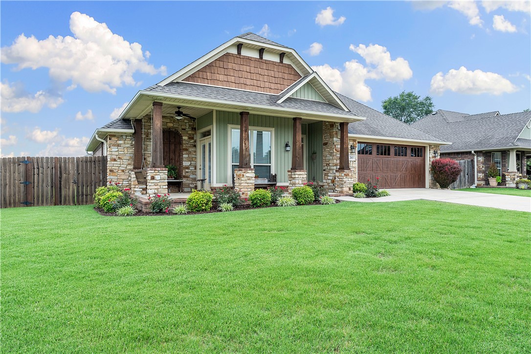 You’d be hard-pressed to find a cleaner, more lovingly cared-for home. This 3-bedroom, 2-bathroom property is located in the highly sought-after Elk Horn neighborhood in the growing town of Pea Ridge—just 15 minutes from both downtown Bentonville & downtown Rogers, and only minutes from the world-renowned Bella Vista mountain bike trails. From the moment you arrive, the inviting front porch with picturesque swing set the tone. Step through the door to beautiful wood-look tile flooring in the main living areas, with carpet in the bedrooms for added comfort. The thoughtful split floor plan provides privacy, placing the primary suite—complete with an en suite bath—on one side of the home, while the two additional bedrooms are situated on the other. Step out back to enjoy a beautifully landscaped yard, featuring a mature shade tree and plenty of space for outdoor living and entertaining. This is a one-owner home that has been meticulously maintained. It’s ready for its next owner to create new, lasting memories.