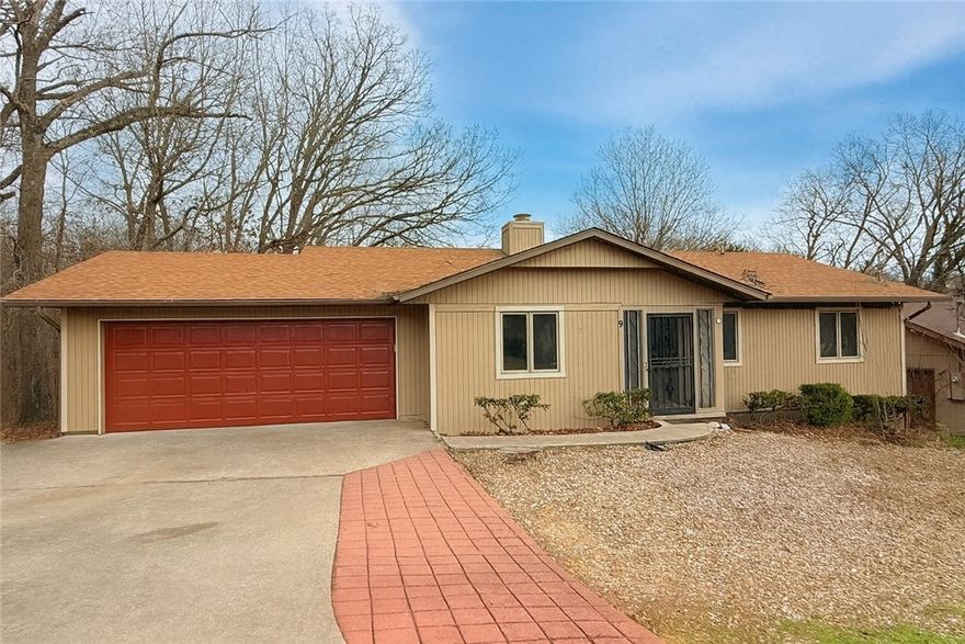 Completely refreshed and move-in ready, this peaceful home is tucked away on a quiet street while still offering easy access to all the amenities Bella Vista is known for. Recent updates include fresh interior and exterior paint, beautiful wood flooring, granite countertops, tile finishes, and stainless steel appliances throughout. The home features 4 bedrooms and 3 bathrooms, along with a finished walk-out basement that provides a spacious second family room, bonus room, and abundant storage. Enjoy outdoor living on the large covered deck, perfect for relaxing or entertaining. Additional highlights include a 2-car garage and a functional layout designed for everyday comfort. Located in the Bentonville School District, this home offers a great blend of privacy, space, and convenience.