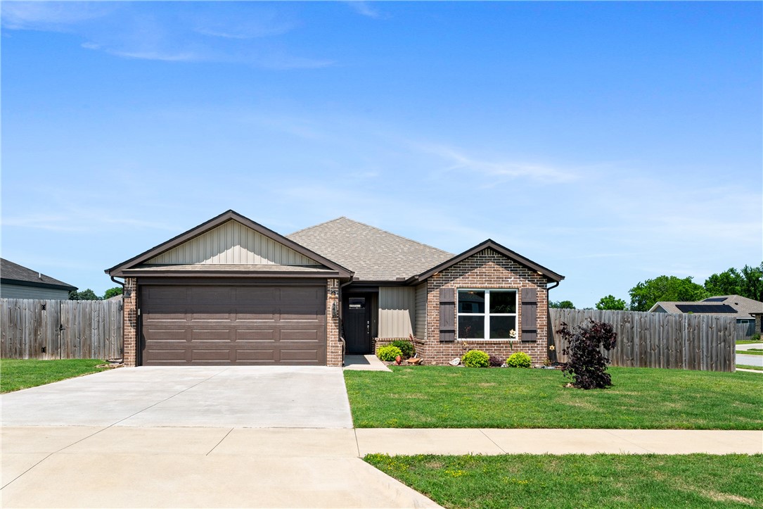 Beautifully maintained home on a corner lot in a well-kept neighborhood, offering more yard space and added privacy. Enjoy gorgeous country views from the subdivision’s edge, giving the home a peaceful feel. Inside, the open-concept layout features a spacious living and dining area flowing into a modern kitchen with granite countertops, stainless steel appliances, and ample cabinet space—ideal for entertaining or everyday living. Natural light fills every room, enhancing the inviting atmosphere. The primary suite offers a peaceful retreat with a private en-suite bath and generous closet space, while two additional bedrooms provide flexible options for guests or a home office. Step outside to the fully fenced backyard and enjoy the 10x16 storage shed, a great bonus for tools or seasonal items. Washer, dryer, and refrigerator convey, making this home move-in ready. Conveniently located minutes from schools, parks, shopping, and all the amenities of Farmington and nearby Fayetteville. *1% Preferred lender Credit*