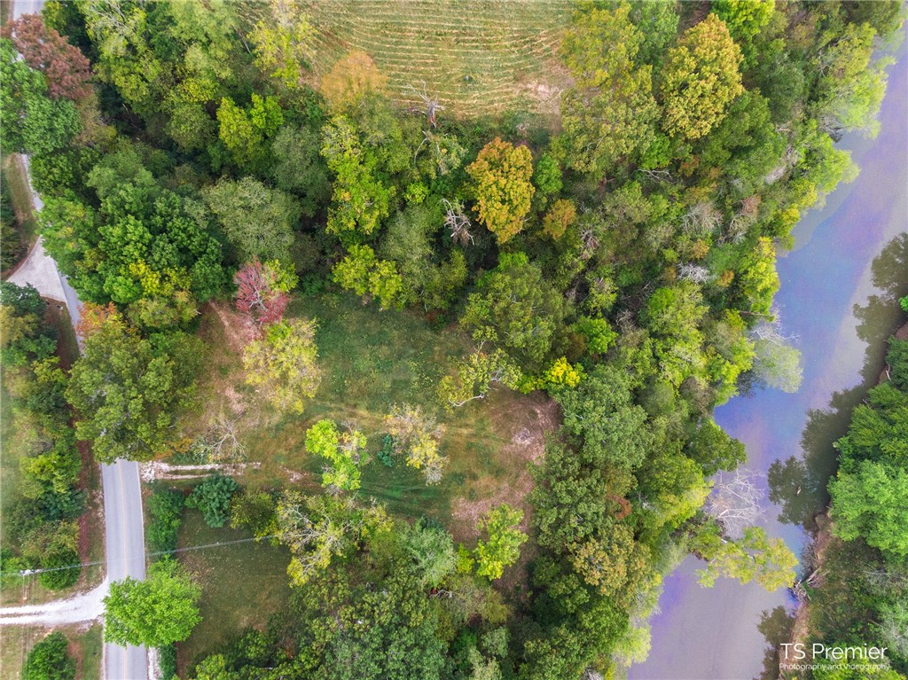 Found it! The perfect lot for your dream home! Ask about the perfect spot to build the perfect home on this great lot in East Fayetteville
⢠Waterfront property with over 200 feet of Richland Creek shoreline, access to the water for
excellent fishing and floating opportunities
⢠Amazing views east over the Hunt's ranch
⢠One property outside of the Beaver Lake Project Limits and Beaver Lake Wildlife Management Area
⢠Secondary spring-fed creek along the north property line
⢠No POA or covenanted building restrictions
⢠Unique outcroppings and cave along shoreline
⢠10 minutes to Mission and Crossover
⢠Fayetteville Schools - Vandergriff, McNair, Woodland
⢠Water, Electric, and Gas at site. Perk tested approved by ADH for septic system
⢠Survey available
This is an excellent location and lot for your dream home!