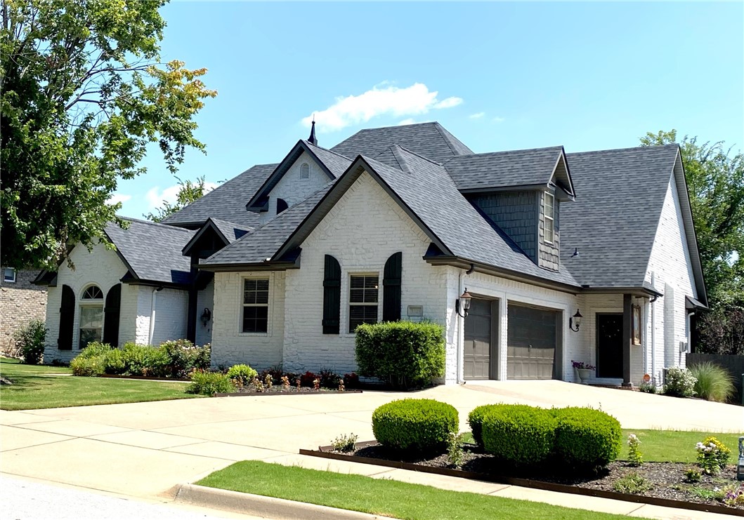 Come home to this Fayetteville stunner! Located in desirable Copper Creek subdivision. This home has it all. 4/5 bedrooms and 3 full baths with a powder room downstairs. Bonus room or office could easily be considered for 5th bedroom. Inviting formal dinning and eat in kitchen, vaulted ceilings, gas fireplace, two family rooms, office and large master bedroom downstairs. Granite counters, tile and wood flooring. Beautiful professionally landscaped yard with two patio's and a composite deck for entertaining. Three car garage, wired for sound, vivint security system and central vac. Copper creek subdivision is in a prime NWA location, connected to greenway bike trail, botanical gardens and lake Fayetteville. Quick access to I-49, FAC and NWA mall. Neighborhood amenities include community pool, tennis, pickle and basketball courts, children's park and fishing pond. New roof and new HVAC. All appliances convey and owner is offering a 1 year home warranty. Agent is related to seller. Schedule your showing today!