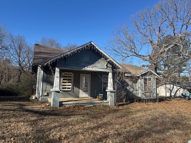 GREENLAND CHARMER. CASH OR IN-HOUSE FINANCING ONLY. As is, where is, this little bungalow with detached garage sits on a large .92 acre lot. Ten minutes from UofA and downtown Fayetteville and 30 minutes to Bentonville and Rogers, welcome home to beautiful Greenland. City of Fay water/sewer, Black Hills Gas, Ozarks Electric and hi-speed internet. Quiet, safe, friendly community. This home is a blank slate just waiting for someone to make it theirs.