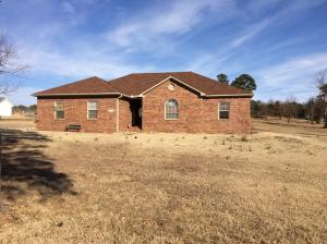 Motivated Seller! Gorgeous practically new home in a scenic country location with 2 acres! Offering a cozy fireplace, spacious kitchen, and a lovely master suite with spacious bath and garden tub plus walk in shower. The office is plenty big enough for a 4th bedroom and there is a two car garage! THIS HOME CAN ALSO BE PURCHASE WITH 3.7 ACRES FOR $187,900!