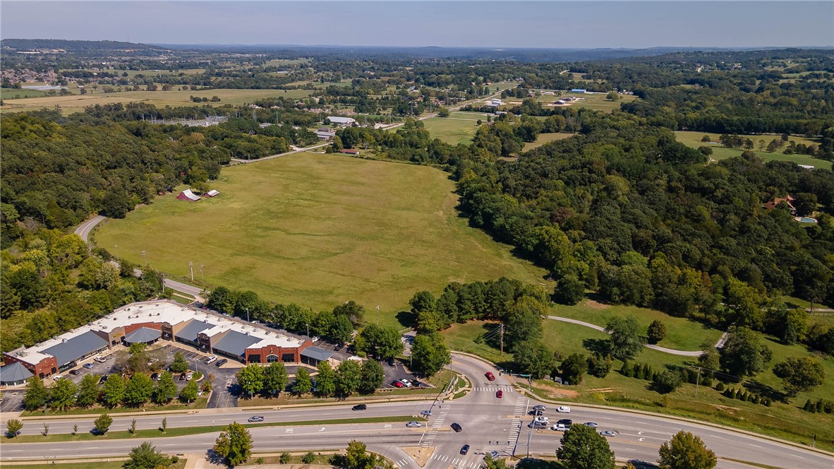 Incredible opportunity to own 27.779 acres of developable land in East Fayetteville! Prime location with high visibility! Perfect for high density or commercial development. Property has a 6” water line that runs through it as well as a city sewer man hole with a 12” line that is just south of the property on the east side of Joyce. Full survey is attached to the MLS.