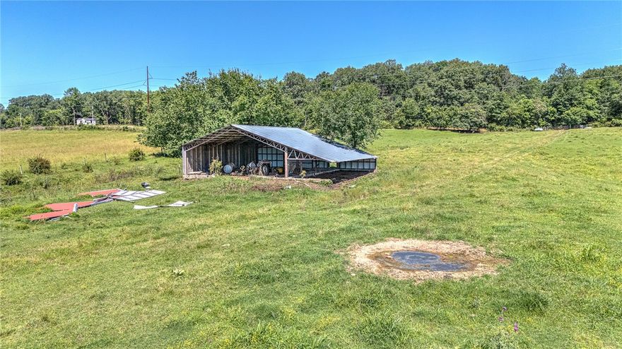 Beautiful 16.83± acre tract located on Haden Road in the highly desirable Bentonville School District. This property offers a spacious and versatile setting with ample room for a private estate, mini-farm, or future development. The land provides a peaceful, rural atmosphere while still being conveniently located near Bentonville schools, shopping, dining, and area amenities. Whether you’re looking to build, invest, or enjoy open space, this tract presents an excellent opportunity in a prime Northwest Arkansas location