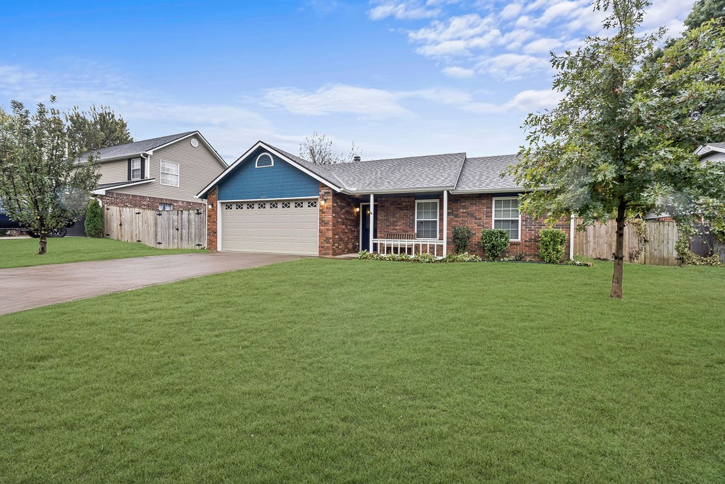 Charming home in the Willow Springs Subdivision! Beautifully maintained residence is a true gem, offering a functional, open floorplan for everyone. The flow between the main living areas is seamless, ideal for both everyday life and entertaining. Cozy corner fireplace is perfect for relaxing on chilly evenings and adding a touch of architectural warmth. Delightful eat-in kitchen offers stainless steel appliances, tiled backsplash and wonderful dining area with splendid natural light. Spacious bedrooms provide practical living. Yard is spacious and well-maintained, offering plenty of room for gardening or play. Security system conveys with the sale, future monitoring up to buyer. Wonderful location has easy access to I-49, making commute a breeze and is just minutes from shopping, dining, and entertainment centers. Home perfectly blends style and convenience, offering a comfortable retreat in a highly desirable, accessible location. Only 10 minutes from University of Arkansas. Move in ready and waiting for you!