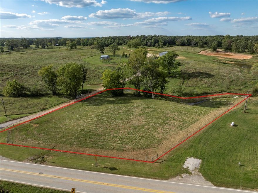 Discover a great opportunity with this 1.61-acre parcel in Gravette! The land is mostly flat, making it highly usable and ready for your vision. At the back of the property, you’ll find a peaceful spring-fed creek, adding a touch of natural beauty and charm. Whether you’re looking for an investment, a future build site, or a place to enjoy the outdoors, this property is full of potential.