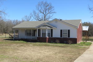 Enjoy a comfortable lifestyle on this 9+/- acres, Featuring 4 spacious bedrooms, two huge living rooms, Safe Room and a detached shop for all outdoor needs. This is the perfect spot if you are looking to get away from the city life.