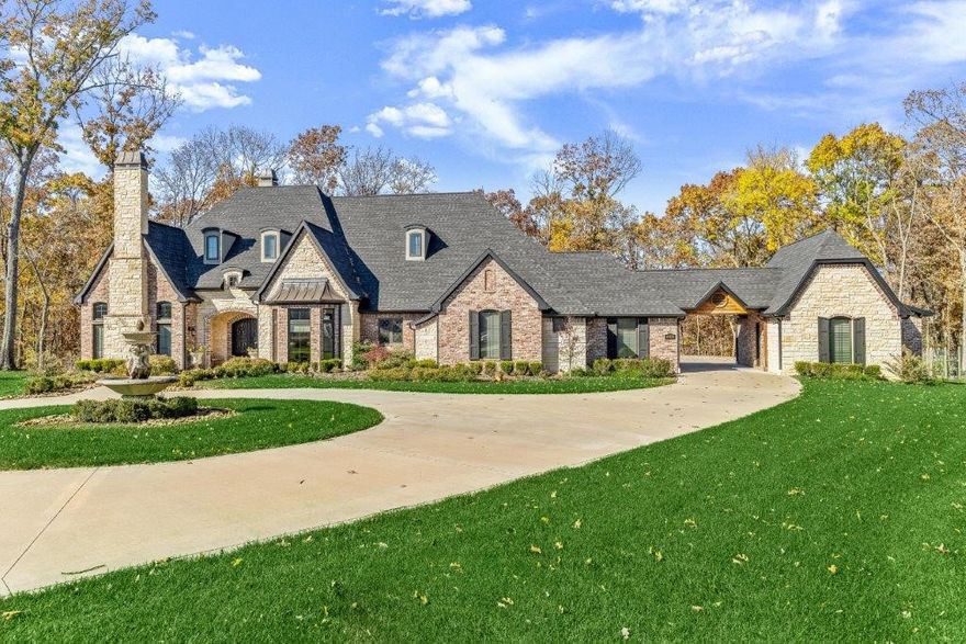 Custom Copper Ridge Estate! 4.83AC in private wooded setting in cul-de-sac. Boasting spacious open layout & gorgeous high end features such as hardwood floors, granite counters, 12' ceiling, wainscoting, built-ins, coffered ceilings & more! Formal dining. Office w/FP & abundant built-ins. Large living room w/gas FP open to sunroom & oversized EIK. Sunroom w/custom tile floor & abundant windows & access to outdoor living space. Chef grade kitchen features Blue Star gas range, touch tech faucets, pantry, island & more! Media Room on main. Huge mstr suite w/gorgeous views, spa-like bath w/soaking tub & WIS. His & Her WIC. Oversized Hers closet w/separate shoe closet & vanity. 3 Guest beds on main each w/bath access. Massive Bonus rm up w/lrg wet bar, bathroom & office/craft room. Laundry w/built in dry rack & wash sink. Outdoor features irrigated vegetable garden & almost 5 AC of property w/seasonal stream. 3 car garage w/full bath accessible from backyard. 4th car detached garage. Exceptional quality & craftmanship!