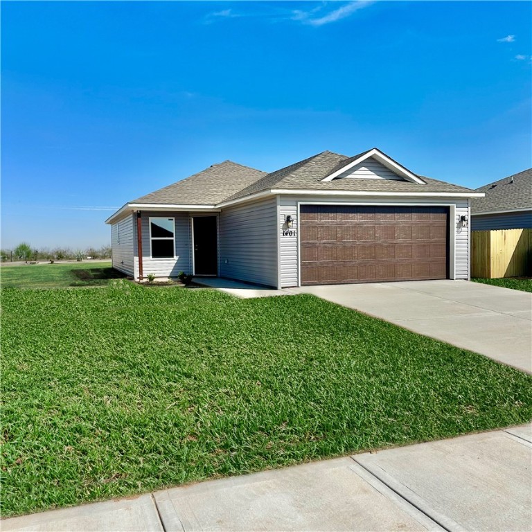 This home is eligible for up to $7,500 in closing cost assistance when using preferred lender and title. Situated on a large corner lot, embrace the charm of the Carlie ll plan, a 3-bedroom, 2-bath home designed for seamless living. Its open floor plan encourages easy interactions, while the covered entry enhances curb appeal and makes a stylish entrance statement. Relax in the spacious living area and savor the inviting eat-in kitchen, complete with energy-efficient appliances. Step into your future and discover more about this remarkable home today!