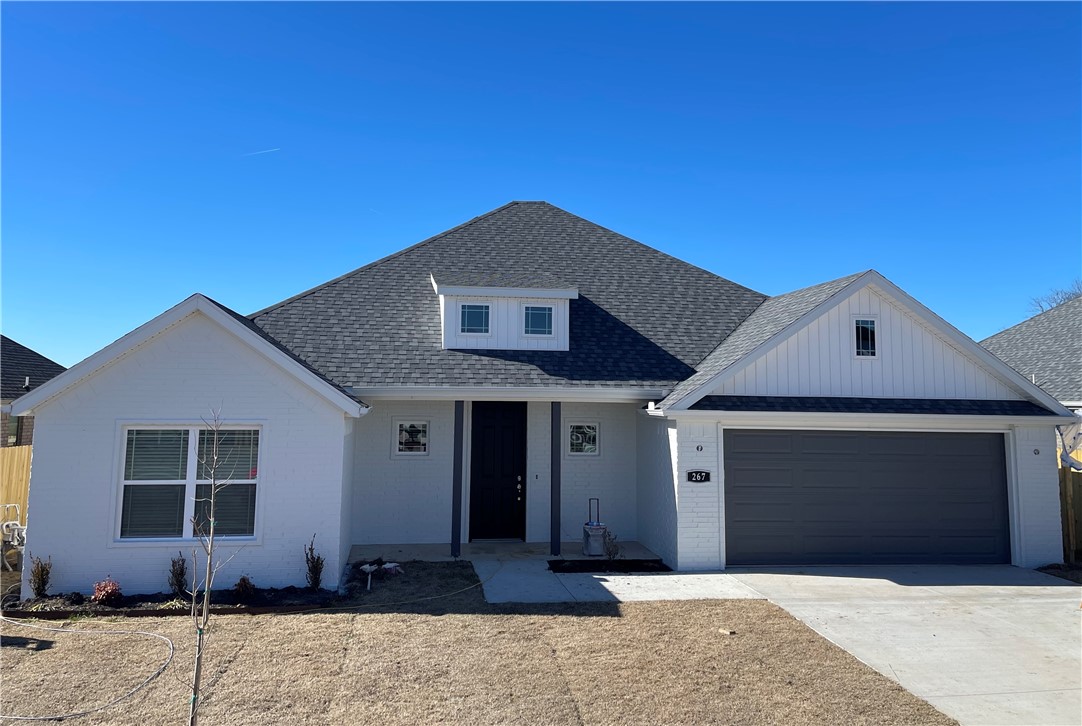 Welcome to the Stella, a one-story ranch style home with the perfect combination of utility and elegance. This floor plan is 1,848 sqft with 3 bedrooms, 2 bathrooms, and a finished 2 car garage with an attached mudroom. One of few manors with the mudroom included, this serves as a convenient space for families to store heavy clothing during the winter, muddy clothes after an active day outdoors, or anything in between. In addition, the Stella includes an incredible design to host in any season. The vaulted ceiling in the living room combined with a vast island and kitchen just steps away creates a spacious common area for any number of occasions. From family movie night to a Superbowl watch party, the Stella has more than enough room for your family and guests! This floorplan is also great for grilling and spending time outdoors as an expansive covered back patio serves as the focal point of the backyard.