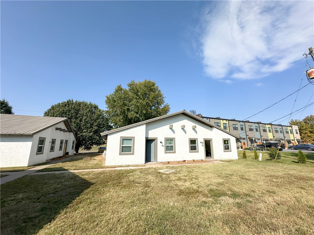 Opportunity Zone eligible. Located directly east of the newly expanded Luther George Park. Within walking distance to Springdale's vibrant downtown area which includes restaurants, shops, entertainment and major employers. The Razorback Greenway trail is located only 200' to the south which connects tenants to all of NWA. Current ownership has added utility lines on two of the buildings for washer & dryer connections to capture rent premium. For proven value-add strategy, new owner could do the same on the remaining buildings.