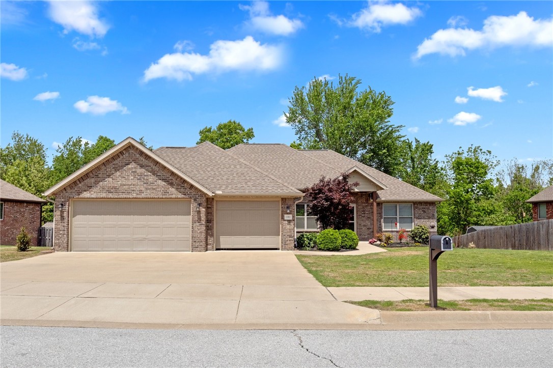 This well maintained 3-bedroom, 2-bathroom home offers 1,941 sq ft of living space and is located in the desirable Stonecrest Subdivision on the edge of Siloam. Built in 2016, the home features a spacious living area with a cozy gas log fireplace, high ceilings, and plenty of natural light. The open-concept kitchen is equipped with modern appliances, ample cabinet space, and a breakfast bar, while the formal dining area offers versatile options for your lifestyle. The large primary suite includes, walk-in closet, and a luxurious bath with a jetted tub and separate shower. Step outside to a covered patio overlooking partially wooded backyard, offering a private space for relaxation and entertaining. With a 3-car garage, Mud Room, and close proximity to schools and local amenities, this home combines comfort and convenience. Don’t miss the opportunity to make it yours!