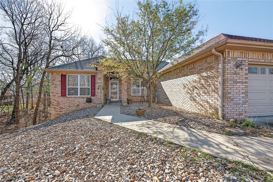 Welcome to this well-constructed Bella Vista home offering quality craftsmanship, a smart layout, and meaningful updates throughout. Main bedroom has a bay window and a 6x10.5 walk-in closet. A standout feature is the ~180 SF heated/cooled sunroom (2022) with 10 large windows and direct access to the deck, creating bright, flexible living space. Major improvements include updated central electric HVAC with new condenser and air handler, plus a newer roof (2023–2024). Outdoor living is enhanced by a deck (2017), improved yard with added grass, and a new garage door with windows (2025). Kitchen appliances were updated in 2022, with range replaced in 2025. Safety upgrades include new smoke alarms and exterior door hardware with added deadbolts. Enjoy a short walk to Branchwood Rec Center, golf, and trails, with quick access to I-49 and minutes to Bentonville. Bonus room (no closet). Walk-in crawl space for storage. Dates and room sizes are approximate. Lot next door not included.