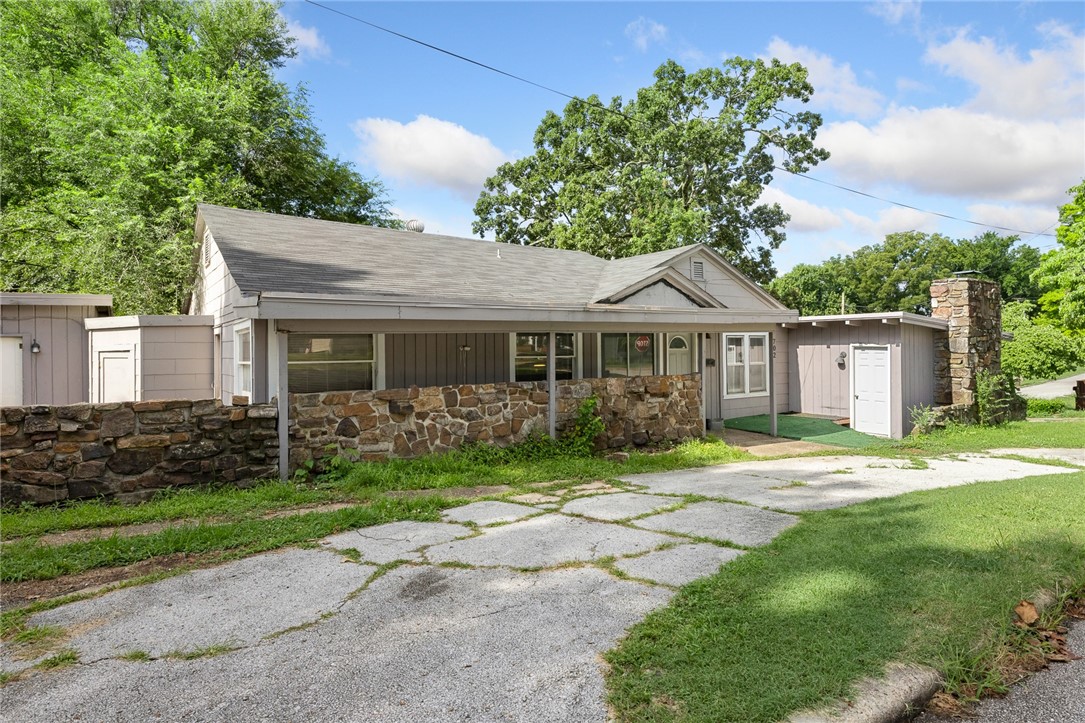 This spacious 3-bedroom, 2-bath home offers a great blend of comfort and opportunity—with the possibility of a fourth bedroom. Updated flooring and fresh paint in parts of the home, it's easy to move right in and make it your own over time. The layout features generous living areas and a practical flow throughout. One of the standout features is a separate area with existing plumbing—ideal for creating a guest suite, in-law quarters, private office, or creative workspace. Whether you need room to grow or you're looking for flexible options, this property is full of potential. Come take a look and picture how you'd make it yours!