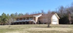 This property is perfection...Pasture, Woods, House, Shop, Pond. With this 3 bedroom 2 Bath all brick home you will fall in love with country living. The house sits up high on the property and has a beautiful view off the front porch. The basement has room to make it exactly what you want. The shop is the perfect size for all your farm equipment or toys! This property is located close to town but still has a private feel. Check it out today.