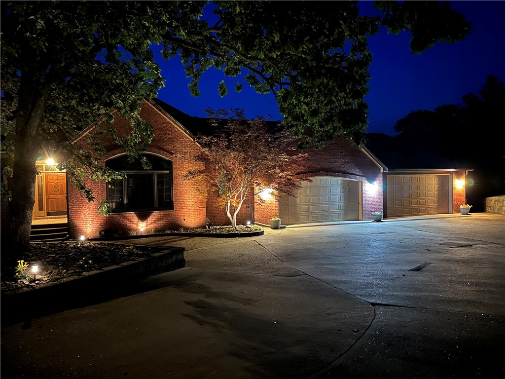 Beautiful, secluded, well maintained home in a quiet neighborhood just minutes to Beaver Lake. The large gourmet kitchens with tons of storage flows openly to the living room and has a formal dining room as well. The primary suite is situated on the main floor and shares a fireplace with a very spacious primary bath. The primary also has a large screened in private deck. On the lower level you will find 3 additional bedrooms, a second living area with a fireplace, game room and kitchenette/bar area. Walk out of the basement through another screened in porch area to the gorgeous inground heated pool with a swim up bar. This house is an entertainer's dream! The HOA does have a community boat dock on Beaver Lake. Winter views of Beaver Lake. Only 10 minutes to downtown Rogers, 25 minutes to Walmart Home office and a 45 minute drive to Eureka.