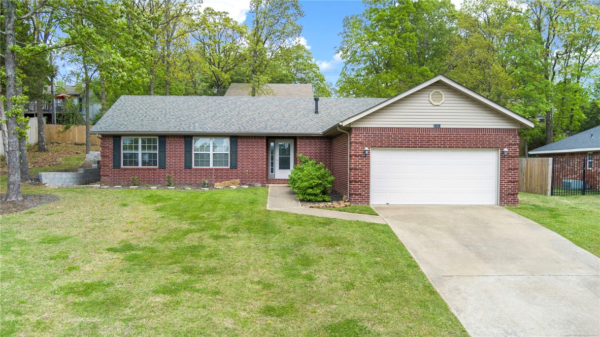 It’s not often you can find a four bedroom East Fayetteville home in this price point! If you’re looking to be in walking distance to Gulley Park, you don’t want to miss this one. Walking in you’ll be welcomed into a warm living room with vaulted ceilings, wood floors, and a gas fireplace with an updated surround. The semi-open concept living space makes this home perfect for entertaining without direct sight lines into the kitchen mess while you’re cooking. With updated paint, countertops, and appliances this kitchen is definitely one you’ll enjoy. This home features a split floor plan with a large primary suite with an oversized bathroom and walk-in closet. The three additional bedrooms and full bath sit on the other side of the living spaces. The owners have done extensive landscaping work to both the front and back yards so it’s ready for the new owners to sit back and enjoy it!