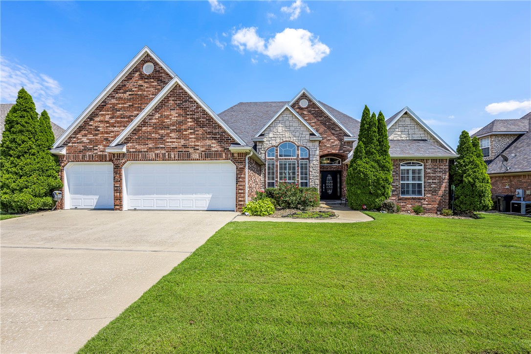 Welcome to Shadow Valley living at its finest! This stunning 3,131 sqft home offers 4 bedrooms, 2.5 bathrooms, a formal dining room, & an upstairs bonus space perfect for a media room. The heart of the home is the beautifully designed kitchen featuring quartz countertops, a KitchenAid gas range, wall oven, oversized refrigerator, & soft-close cabinetry, ideal for both everyday living & entertaining. The spacious primary suite is a true retreat w/ a cozy gas fireplace & access to the covered back patio. Step outside & enjoy your personal backyard oasis w/ a saltwater pool, complete w/ a new liner in 2024 & a professionally landscaped waterfall feature. Whether you’re hosting gatherings or relaxing by the water, this space is built for year-round enjoyment. All of this nestled in the sought-after Shadow Valley community, offering an unbeatable location close to dining, shopping, and all that Rogers has to offer. Major updates roof, HVAC, hot water heater, & pool pump have all been replaced within the last 5 years.