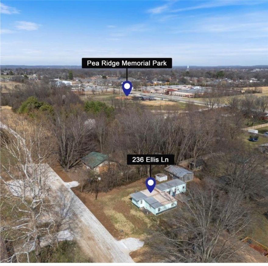 Opportunity awaits in the heart of Pea Ridge! This .30-acre residential lot is ideally located just off Main Street, offering convenient access to schools, shopping, dining, and everything Pea Ridge has to offer. The property is zoned residential and provides a great location for a future homesite or investment opportunity. The existing manufactured home conveys with no value given, allowing buyers to focus on the land and the potential it holds. With its prime location and easy access, this property presents a great chance to build or develop in one of Northwest Arkansas’s growing communities.