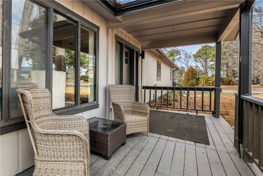 What does owning your own retreat center on just over 2.5 acres near Beaver Lake look like? Probably something like this. This completely remodeled home featuring 4 generous sized bedrooms and 3 baths offers modern updates and convenience with the tranquility of feeling remote. Updated electric, HVAC, and plumbing systems allows for stress less ownership. The open main living area flows seamlessly into a climate controlled sunroom offering a 180 degree view. A flexible floor plan creates dual living quarters for owners and guests. Experience a true escape on the front porch and/or wrap around deck. Additional features include a metal storage building and in garage storm shelter or storage. Experience the perfect balance being close enough to the city for convenience and just far enough out to enjoy the tranquility of being away from the hustle and bustle This rare opportunity is an exceptional home with income potential.