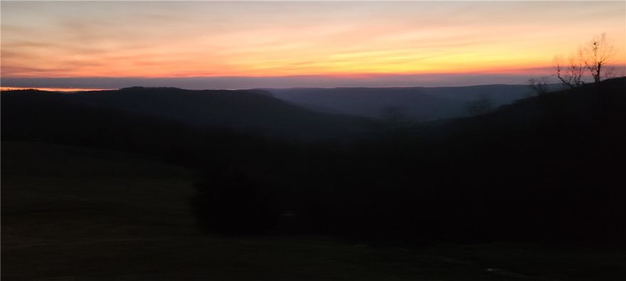 This is an outstanding recreational property. It has miles and miles of trails for utv or horses. It has a horse barn with stalls. It has been professionally managed for whitetail, deer, elk, turkey, and bear for the past 8 years by world renowned Dr Deer and John Butler from Buck Forage food plots. There are numerous waterfalls, creeks, bluffs, you name it and it is there. Adjacent to the Buffalo National Park for at least a mile on the east side of Boxley valley. The view from the complete wrap around porch is of the Boxley church and a portion of Boxley valley. The sunsets from the porch are amazing. Steel Creek, Kyles Landing, Boxley historic district, Ponca, Whitaker Point/ Hawksbill Crag, Glory hole, Low Gap cafe all these are within 20 minutes of the lodge. The lodge itself is set up for entertaining and guests. Stock pond for fishing near the lodge. There is about 60 acres of food plots on the land.