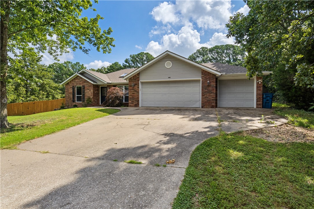 Welcome to the perfect blend of adventure and everyday comfort ideally located near mountain bike trails, the Dogwood & Brittany Golf Courses, Metfield Recreation Complex, and more! This well maintained 3-bedroom, 2-bathroom home is a rare find in Bella Vista with a large flat lot and 3-car garage! Outside features a spacious backyard with a new fence, covered patio, fire pit, and storage shed. Inside you will find a convenient split floor plan, modern wall paneling updates in the living room, eat-in-kitchen, and one of the bedrooms, with an abundance of natural light from the living room skylight. The kitchen features thick granite counter tops and stainless steel appliances. All appliances convey with the home! Additionally, this home is on city sewer rather than septic. The water heater was replaced in 2023 and the energy efficient, dual heat HVAC system was replaced the year prior. Come see everything this home has to offer!